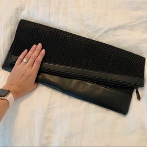 BCBGMaxazria Neoprene and Leather Fold Clutch